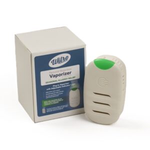 A beige plug-in vaporizer with a green button is displayed beside its box labeled “Wilro Seasonal Allergy Relief Combo Kit,” showcasing product details and branding.